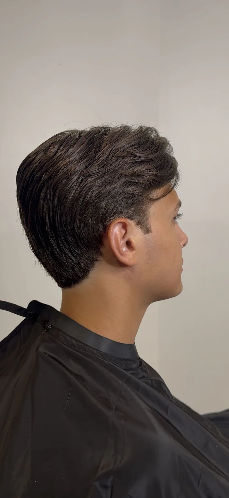 Men’s short haircut with a clean fade by Vlad Barsky